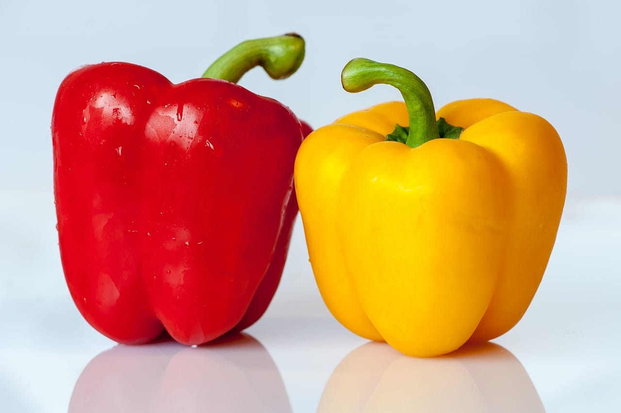 Sweet peppers cooked down slowly are the base of a good shakshuka.